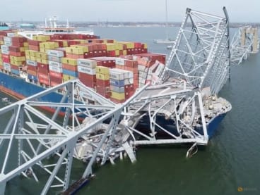 A drone view of the Dali cargo vessel, which crashed into the Francis Scott Key Bridge causing it to collapse, in Baltimore, Maryland, US, on March 26, 2024, in this still image taken from a handout video.