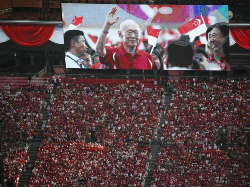 A video tribute of former prime minister Lee Kuan Yew is played during a Golden Jubilee celebration parade rehearsal in Singapore August 1, 2015. Photo: Reuters