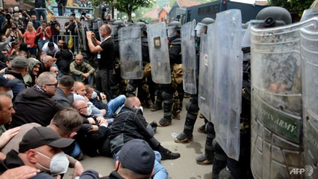 NATO-led peacekeepers step up security after Kosovo clashes