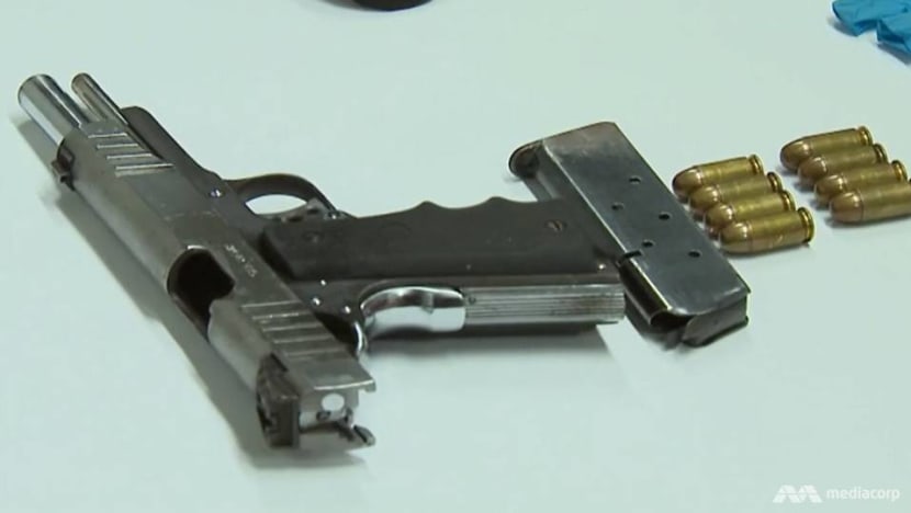2 men charged over loaded pistol found in Jurong West flat, first such case in a decade 2 men charged over loaded pistol found in Jurong West flat, first such case in a decade