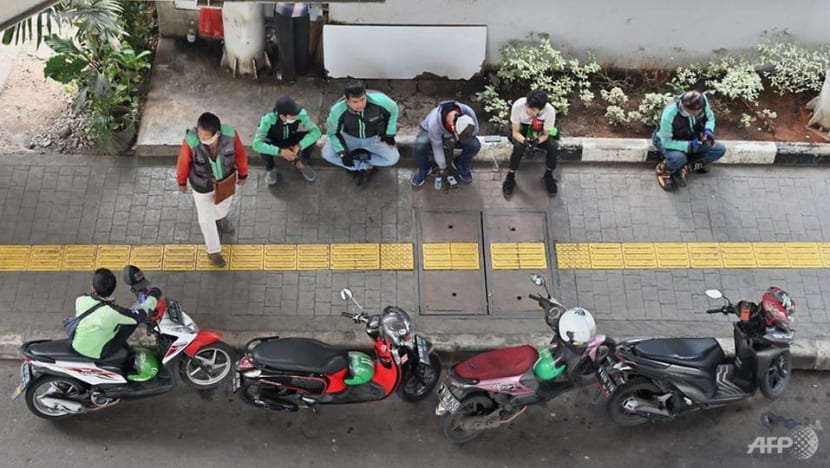 Indonesian Grab, Gojek drivers threaten nationwide protests over merger talks Indonesian Grab, Gojek drivers threaten nationwide protests over merger talks