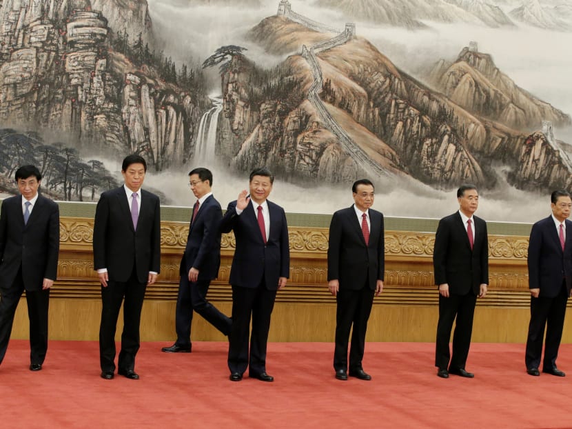 China's President Xi Jinping (centre) and other members of the Politburo Standing Committee: (from left) Mr Wang Huning, Mr Li Zhanshu, Mr Han Zheng, Li Keqiang, Wang Yang, Zhao Leji. Photo: Reuters