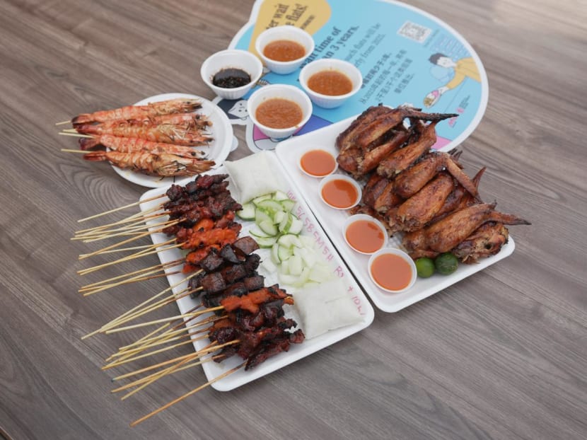 Charcoal-grilled satay and BBQ chicken wings by the beach at East Coast Park