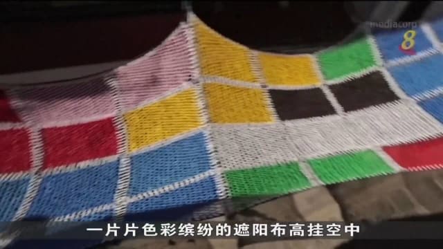 西班牙乐龄人士用再循环材料制作五彩遮阳布