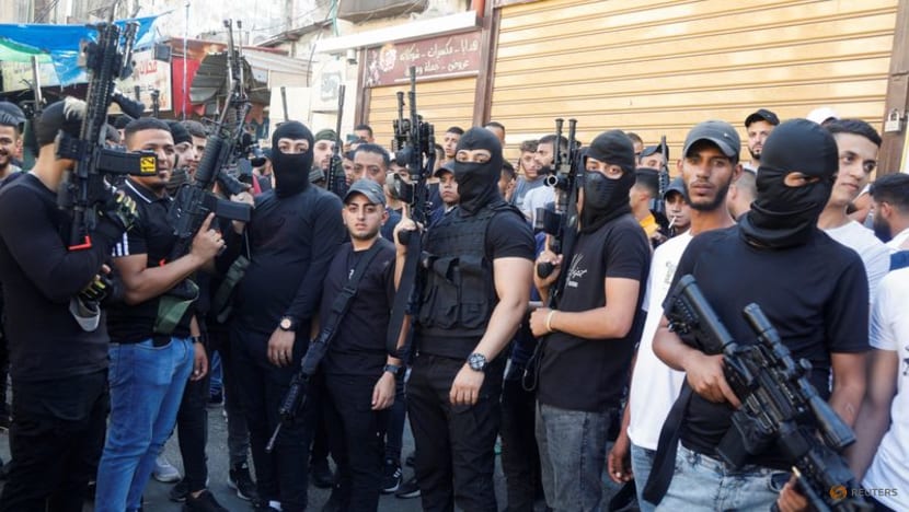 Israeli forces raid Palestinian NGOs, UN criticises 'arbitrary' move Israeli forces raid Palestinian NGOs, UN criticises 'arbitrary' move