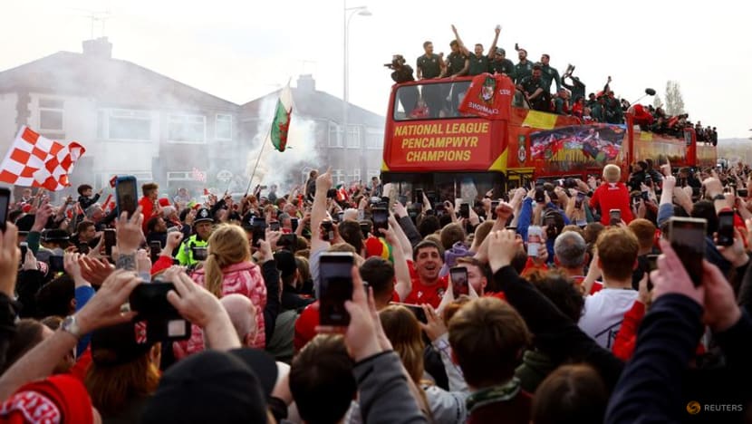 Wrexham paint town red with open-top bus parade after promotion to EFL