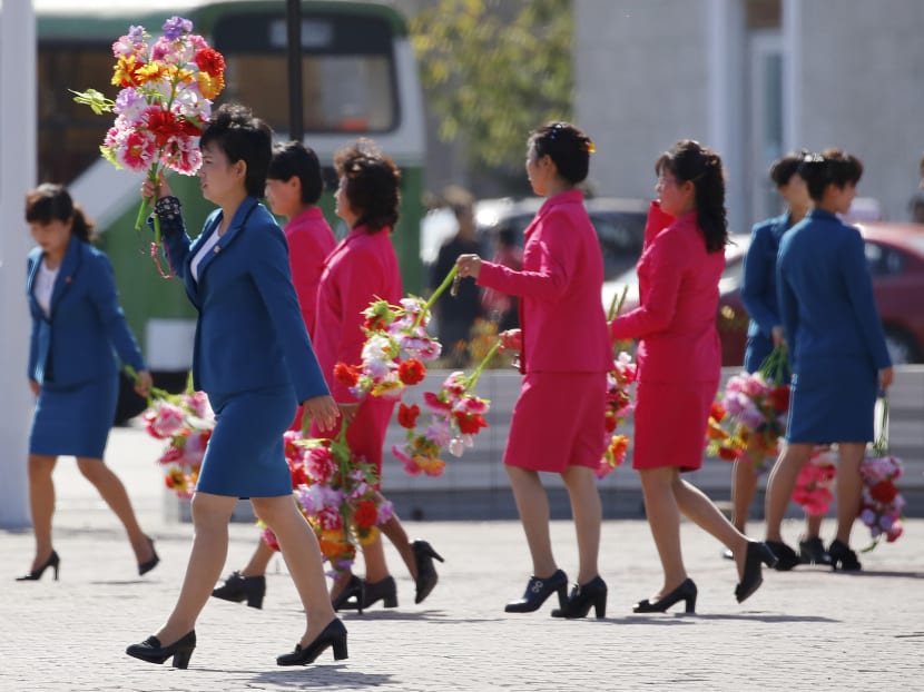 North Korean soldiers parade in massive anniversary celebration
