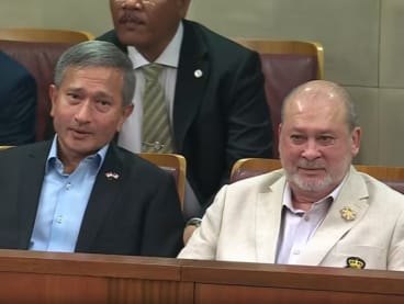 King of Malaysia, Sultan Ibrahim Iskandar (right), accompanied by Minister for Foreign Affairs Vivian Balakrishnan at Singapore's parliament on May 7, 2024.