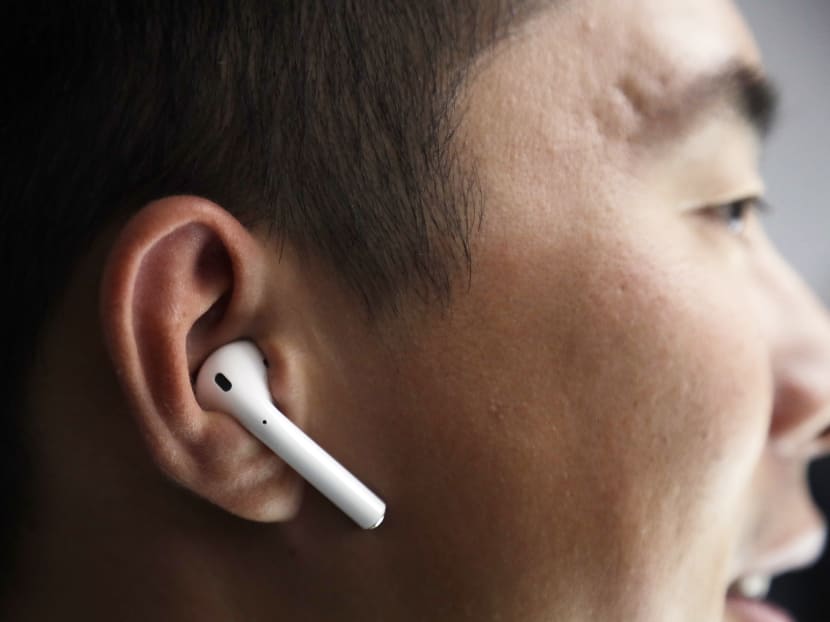 The Apple AirPods are wireless headphones that include a microphone for hands-free calls. This update, and the removal of the headphone jack, have polarised many consumers. Photo: AP