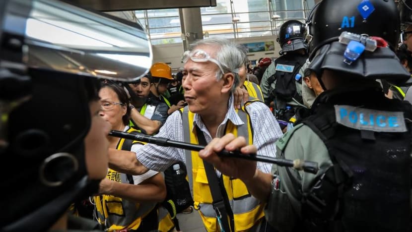 Hong Kong's grandpa protesters speak softly but carry a stick