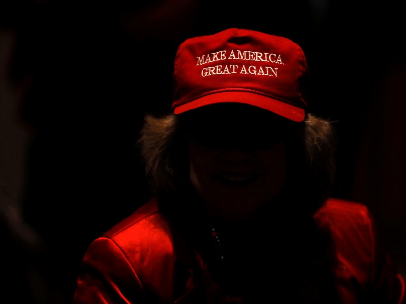 A supporter of President Donald Trump and Republican senate candidate Mike Braun attends the election night party in Indianapolis, Indiana.