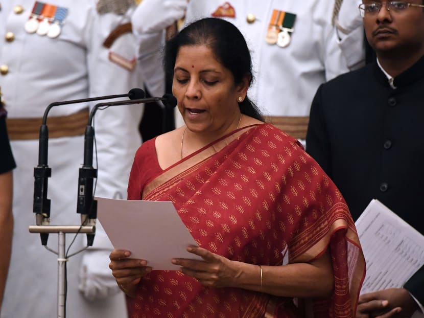 India's ruling Bharatiya Janata Party (BJP) politician and member of parliament Nirmala Sitharaman takes the oath during the swearing-in ceremony of new ministers at the Presidential Palace in New Delhi, India, September 3, 2017. Photo: Reuters