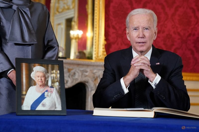 US President Joe Biden attends to sign a condolence book for Britain's Queen Elizabeth, following her death, at Lancaster House in London on Sept 18, 2022. US President Joe Biden attends to sign a condolence book for Britain's Queen Elizabeth, following her death, at Lancaster House in London on Sept 18, 2022.
