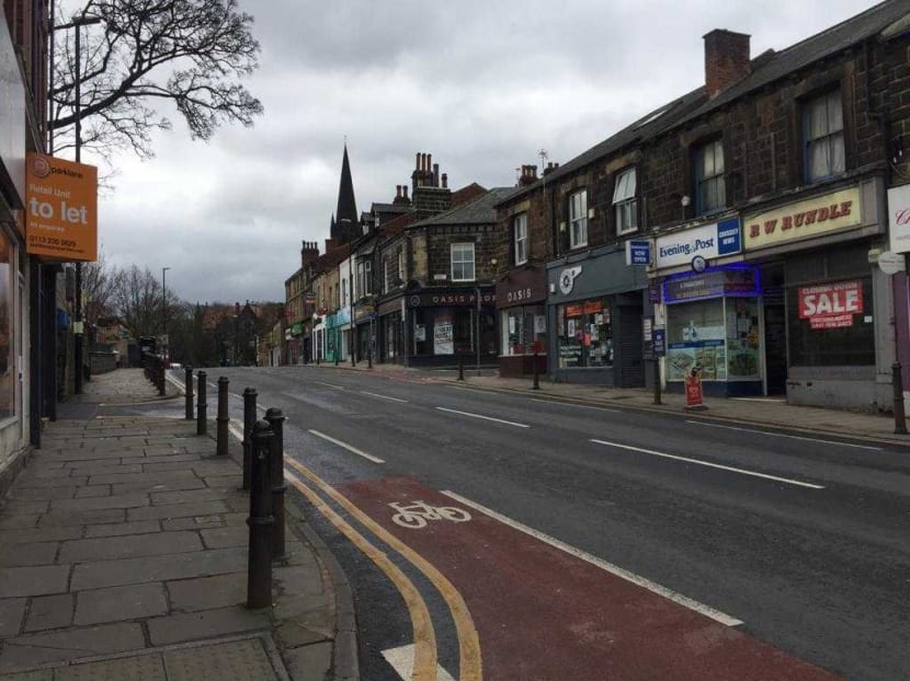 Deserted streets in the usually bustling northern English city of Leeds, population about 500,000, after most shops and other non-essential establishments were closed in a lockdown announced on March 23, 2020.