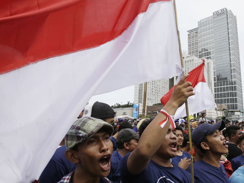 Locals shout slogans during a rally in Jakarta, Indonesia, Dec 4, 2016.  Photo: AP