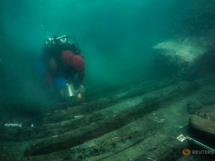 Egypt finds ancient military vessel, Greek graves in sunken city