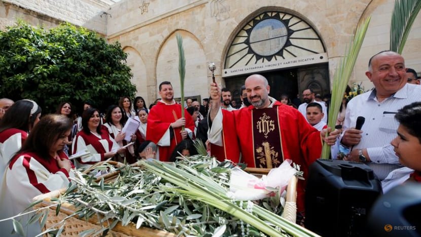 Jerusalem's Holy Sepulchre 'resurrected' for Palm Sunday mass as pilgrims return