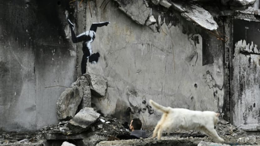 Banksy unveils Ukraine mural in town bombed by Russia Banksy unveils Ukraine mural in town bombed by Russia