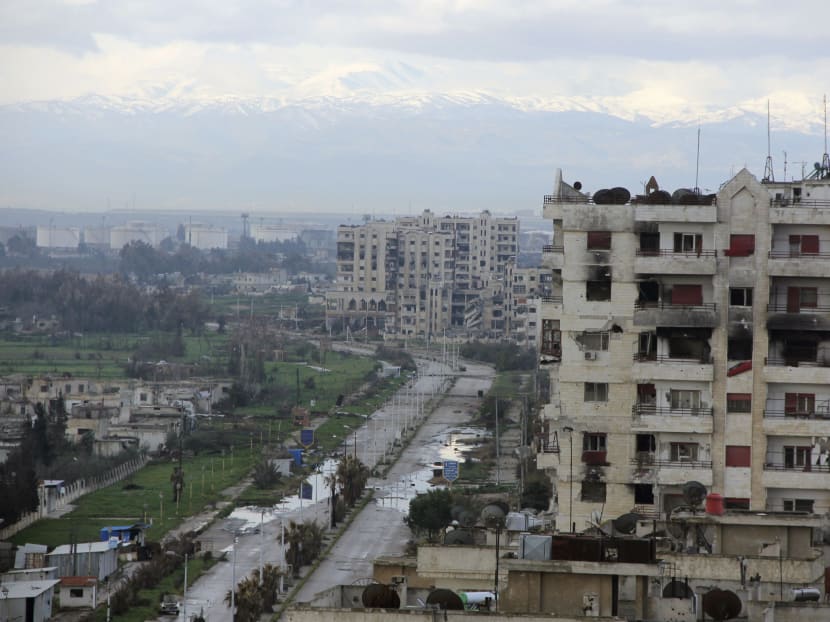 A general view shows an area controlled by forces loyal to Syria's President Bashar al-Assad, as seen from a rebel-controlled area in the northwestern Homs district of Al Waer on Wednesday (Feb 18). Photo: Reuters