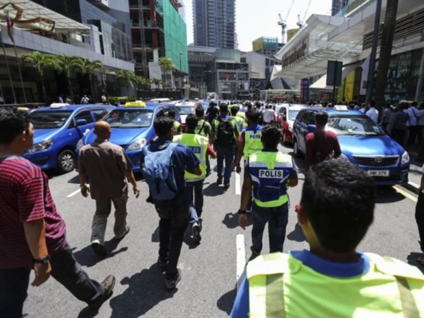 KL to legalise Uber, Grab by year end