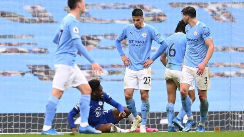 Soccer-City made to wait for title after losing at home to Chelsea