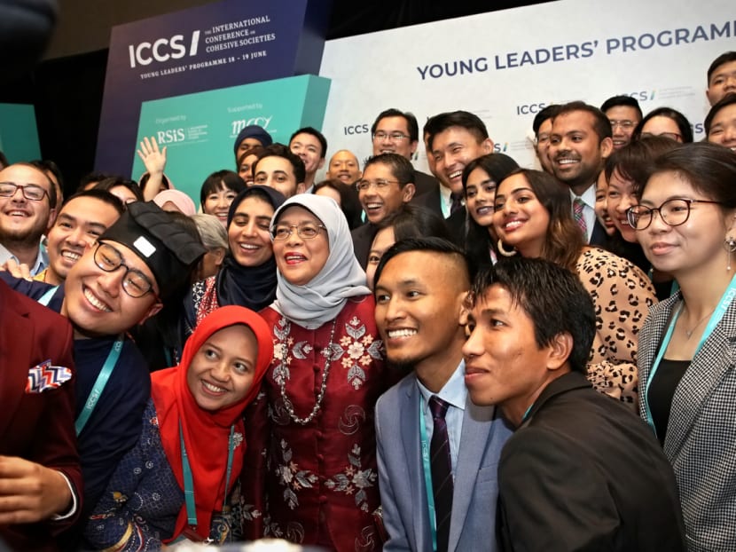 President Halimah Yacob with youth leaders at the International Conference on Cohesive Societies in Singapore on June 19.