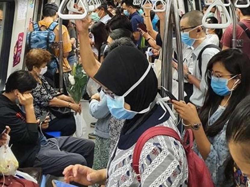 A crowded MRT train on Apr 17, 2020, the first day of reduced transport services.