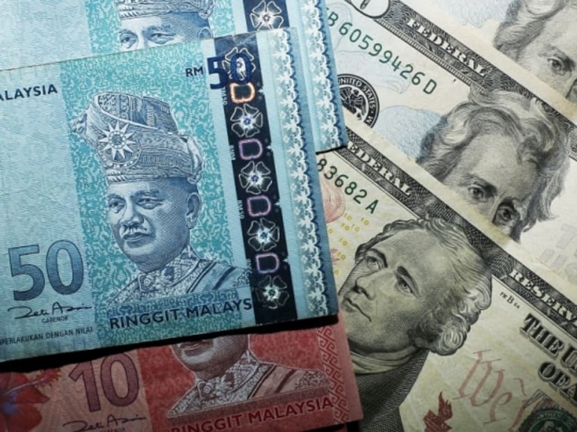 The ringgit reached 4.2990 per US dollar on Aug 26, the lowest since July 1998. Photo: The Malay Mail Online