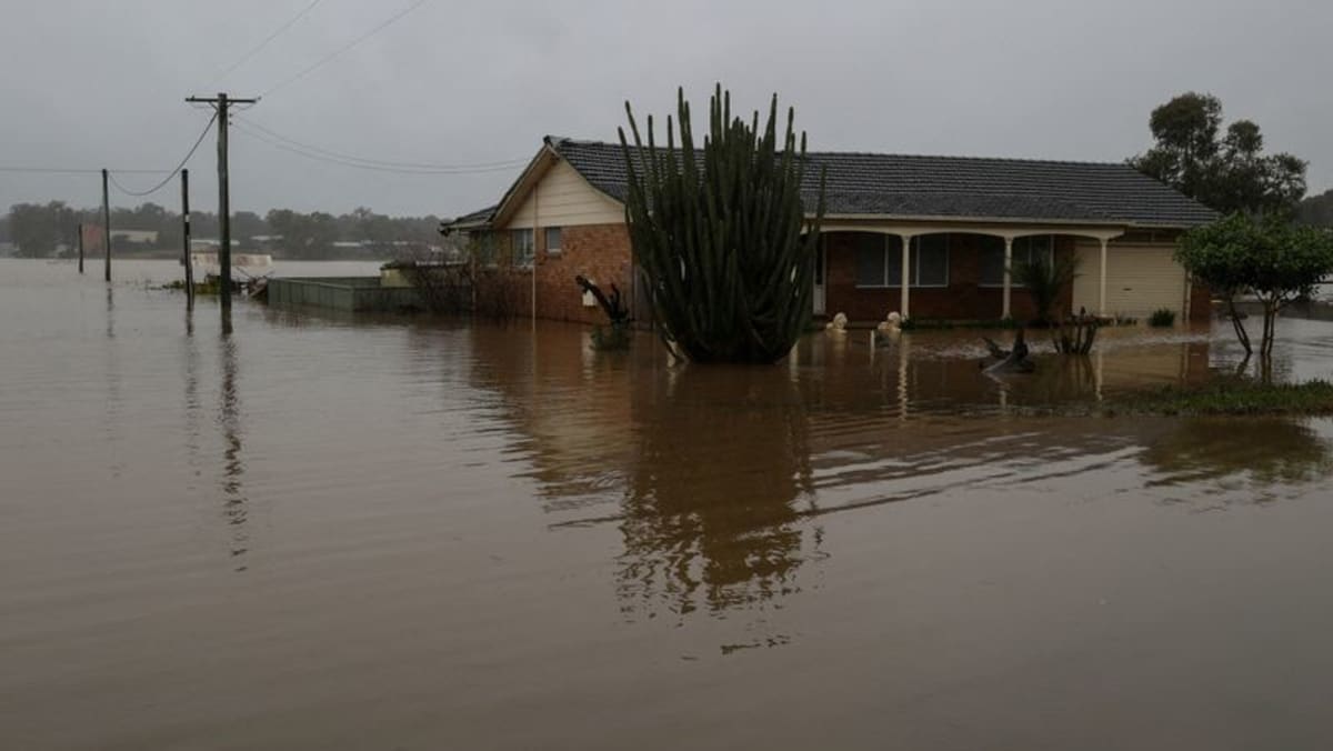 australians-take-stock-of-flood-damage-amid-warnings-of-more-rain