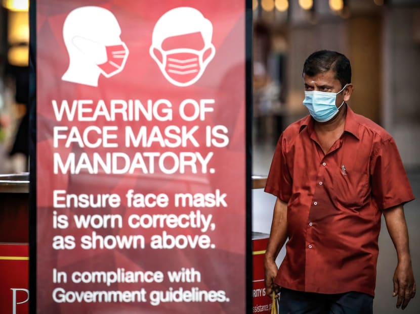 A man in Malaysia wearing a face mask as a preventive measure against the spread of Covid-19.