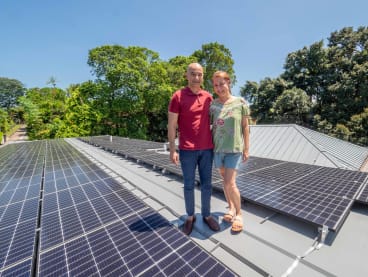 Mr Arun Murthy and his wife, Mrs Sheryl Arun Murthy, pose for a photo on May 12, 2022. In March this year, 100 solar panels were installed on the roof of their house. 