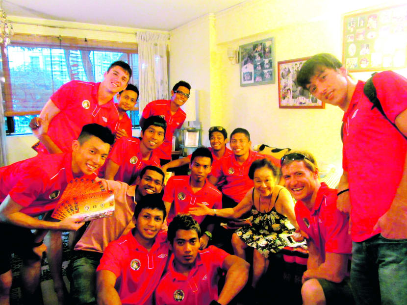 Balestier players (in red) going the extra mile to woo fans to their home S-League matches. Photo: Deborah Ong