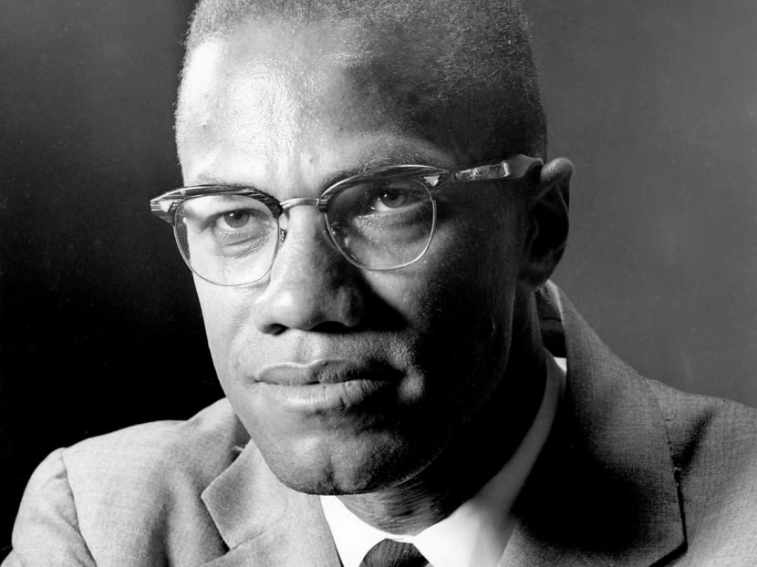 In this March 5, 1964 file photo, Black Muslim leader Malcolm X poses during an interview in New York. Photo: AP