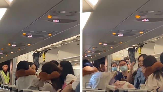 酷航班机上起争执 五名女子互相推搡