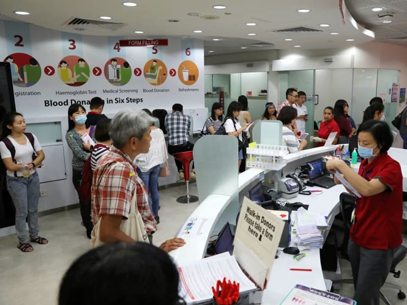 Blood donors waiting in queue at the blood bank located at Dhoby Ghaut on Feb 19, 2020.