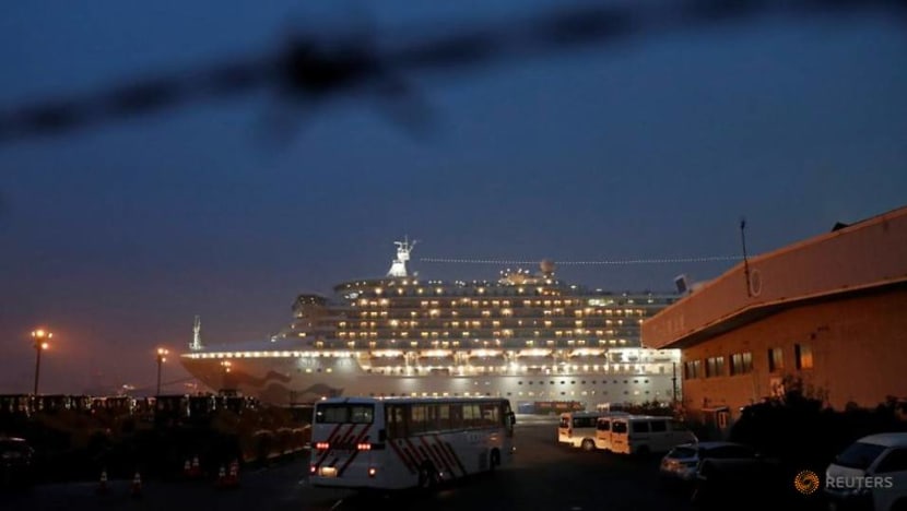 40 US nationals infected on Japan ship as others fly home