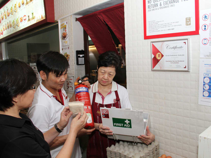 At each Ya Kun branch, two to six CCTV cameras are installed. Posters with SGSecure messages are also displayed, with fire extinguishers and first-aid boxes available. Photo: Esther Leong