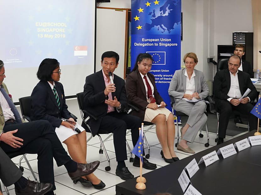 Education Minister Ong Ye Kung speaking to Ambassadors of several European Union countries and students at a dialogue session.