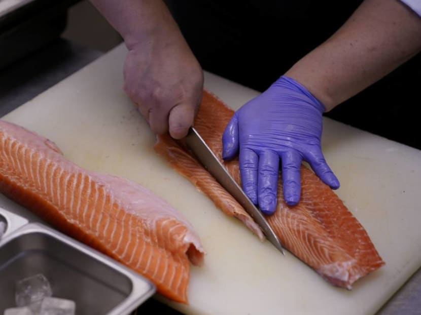 The warning came after epidemiological investigators pinned down the outbreak in Beijing in June, involving 335 cases, to imported salmon sold from a booth in a wholesale food market.