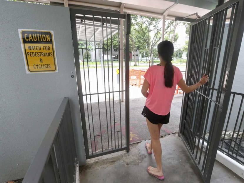 Ms Sally Ng (pictured) believes the warning sign at a gate of the condominium where she lives was put up after she was hit by a cyclist on March 21, 2022. It is not visible in a video of the incident she posted on social media.