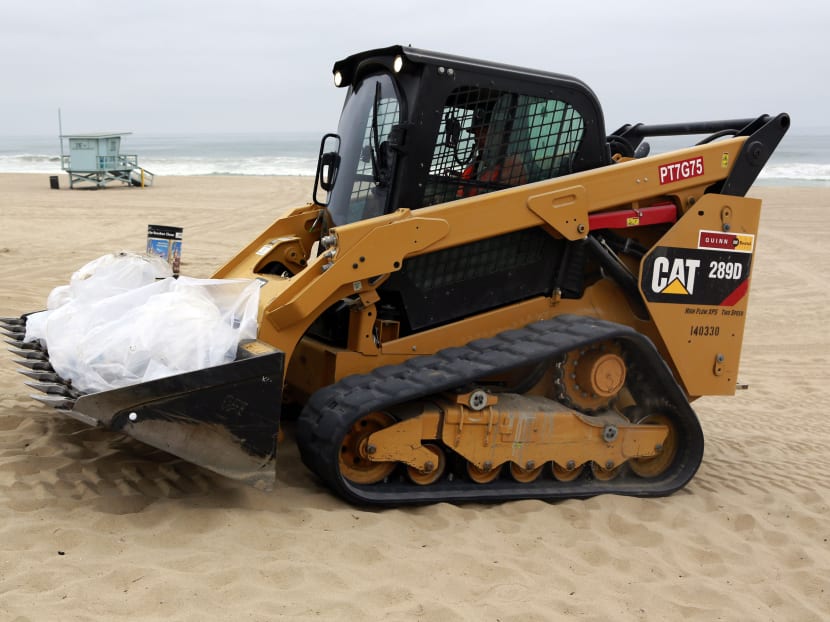 Gallery: Authorities eye reopening of goo-struck California beaches