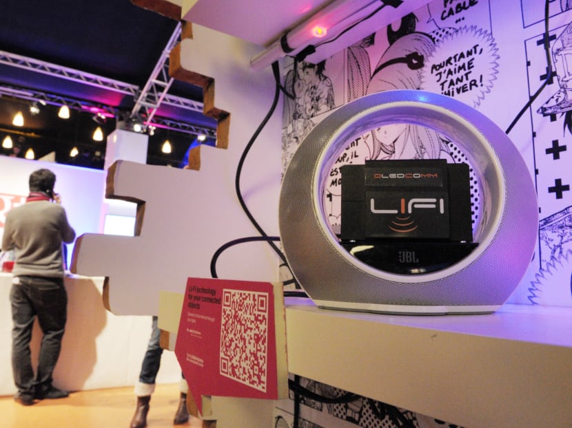 A view of a Li-Fi technology system, which uses light to connect users to the internet and share data, on display at the FranceTelevisions stand inside the LeWeb Paris technology fair, on December 4, 2012, in Saint-Denis, a suburb of Paris. Photo: AFP