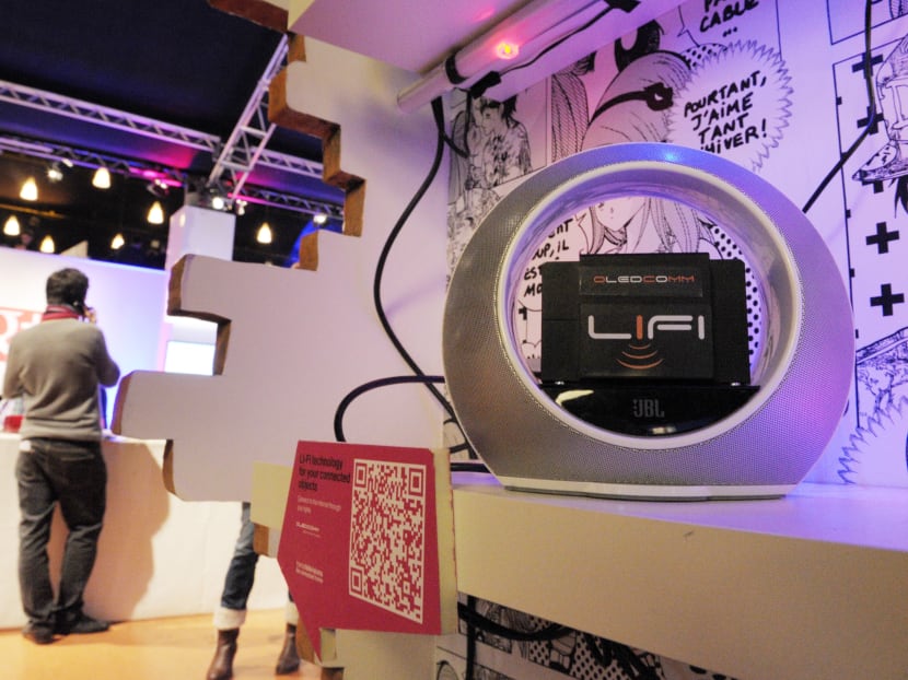 A view of a Li-Fi technology system, which uses light to connect users to the internet and share data, on display at the FranceTelevisions stand inside the LeWeb Paris technology fair, on December 4, 2012, in Saint-Denis, a suburb of Paris. Photo: AFP A view of a Li-Fi technology system, which uses light to connect users to the internet and share data, on display at the FranceTelevisions stand inside the LeWeb Paris technology fair, on December 4, 2012, in Saint-Denis, a suburb of Paris. Photo: AFP