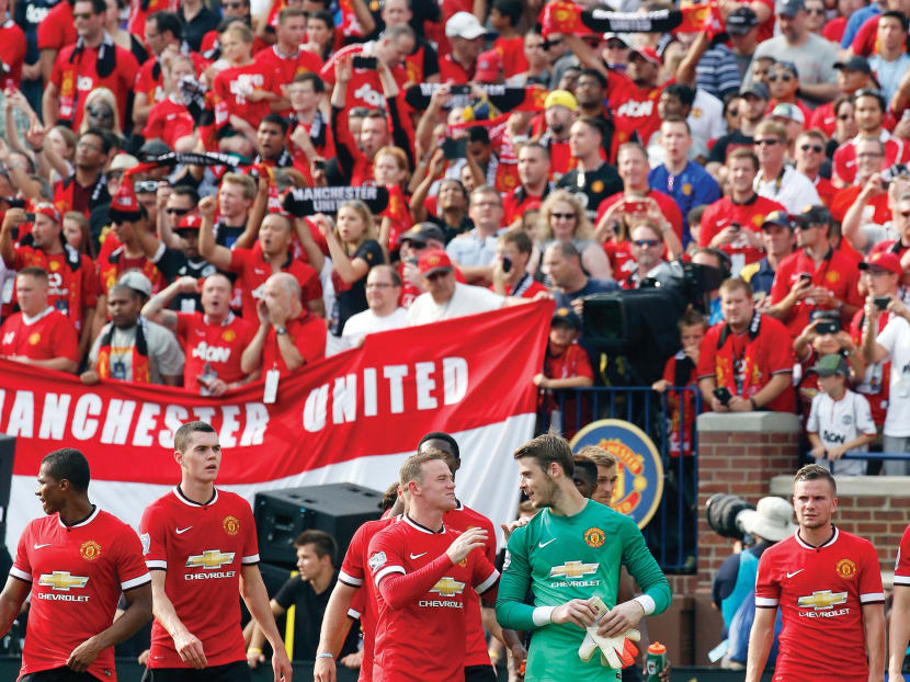 A record crowd of 109,318 packed the Michigan Stadium this month to watch United take on Real Madrid. epa