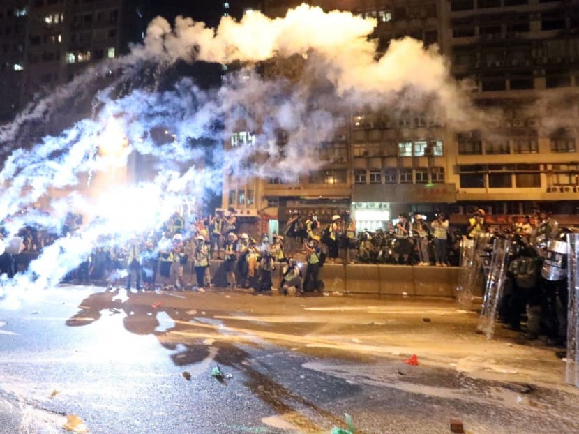 Tear gas is fired during a violent Hong Kong protest, which academic observers fear is the ‘new normal’ for law and order in the city.