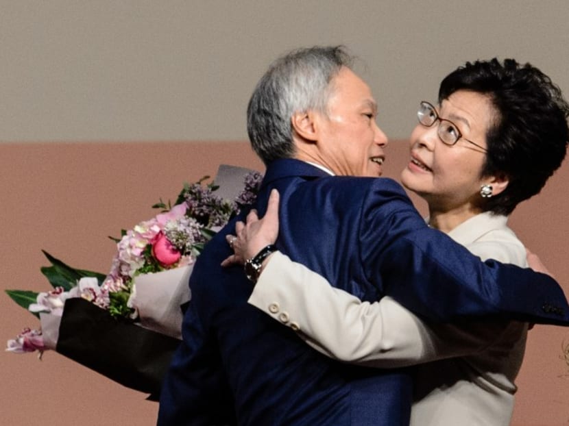 Ms Carrie Lam, hugging her husband, Professor Lam Siu-por, after she won the Hong Kong chief executive election. Photo: AFP