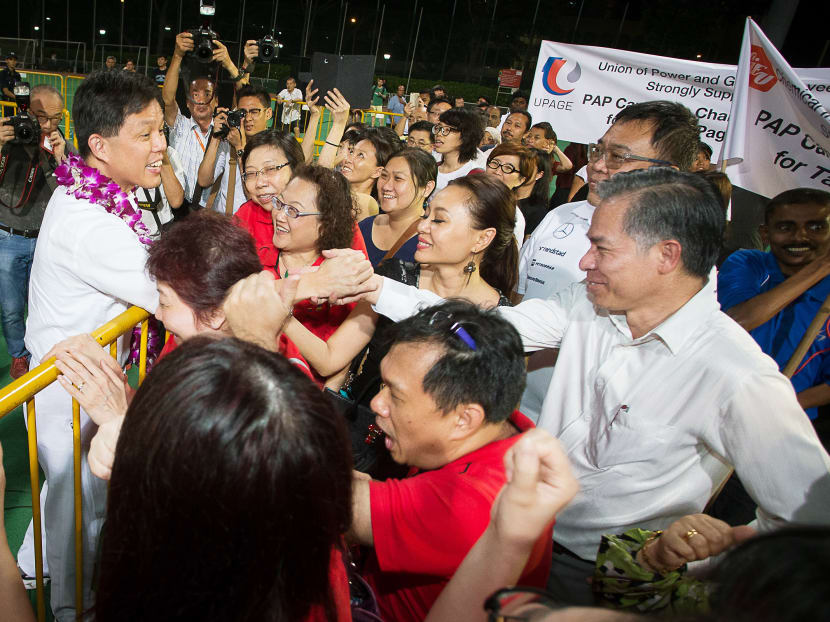 Mr Chan thanking supporters after the rally at the Delta Hockey Pitch last night. In his speech, he outlined three questions he said should guide Singaporeans in electing their MPs. Photo: Ray Chua