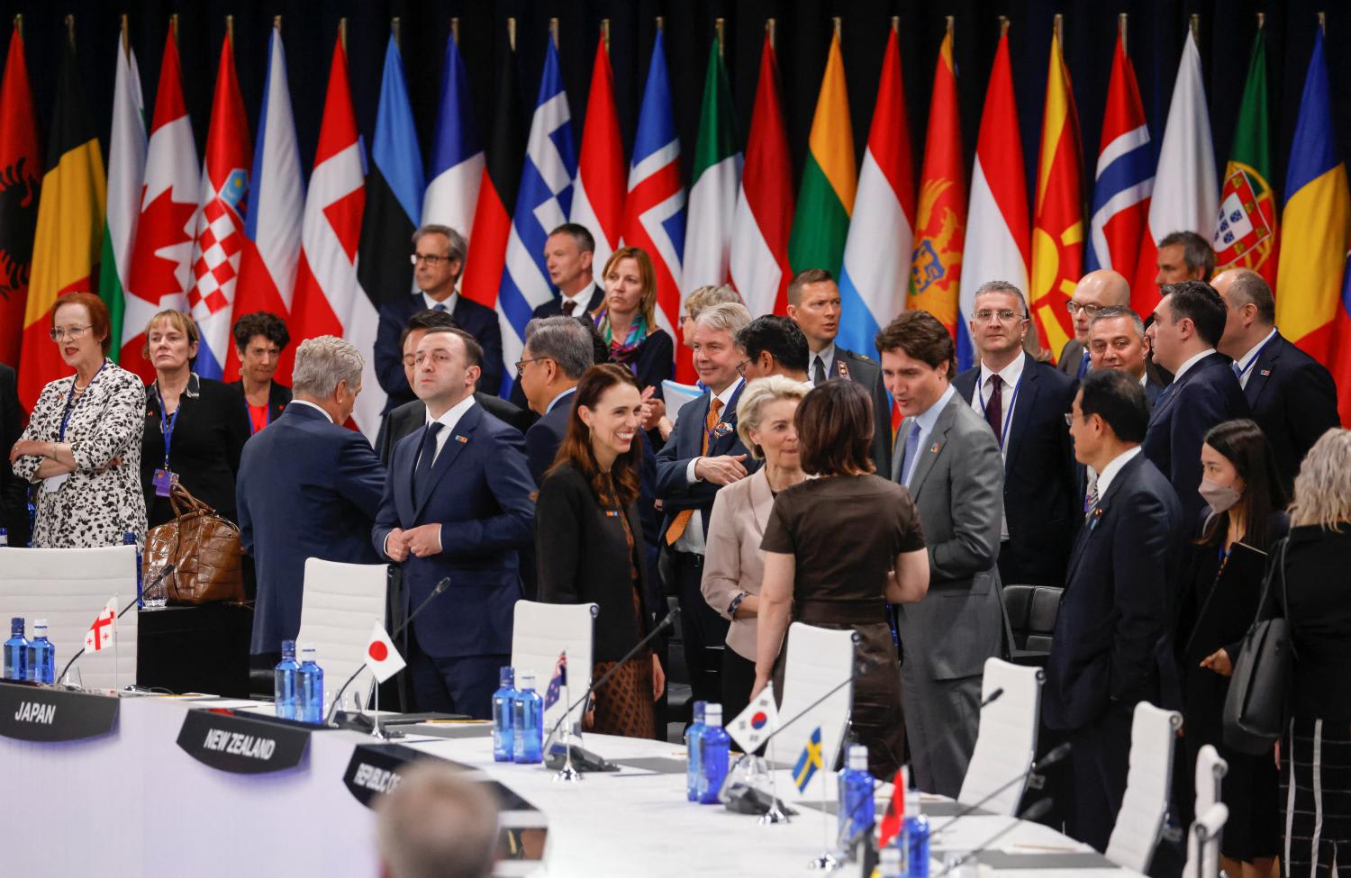 <p>Attendees greet at the Nato summit in Madrid, Spain on June 29, 2022. </p>
<p>Attendees greet at the Nato summit in Madrid, Spain on June 29, 2022. </p>
