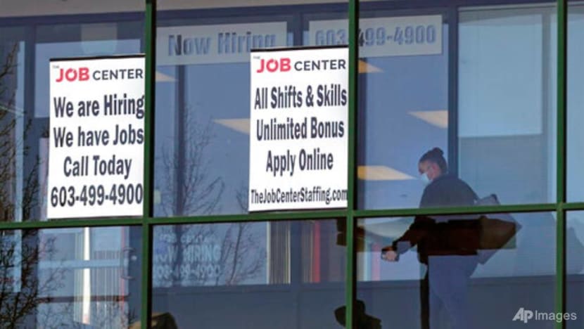 US jobless claims fall to 406,000, a new pandemic low