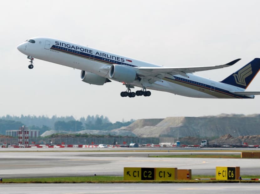 A Singapore Airlines Airbus A350-900 plane takes off at Changi Airport in Singapore on March 28, 2018.